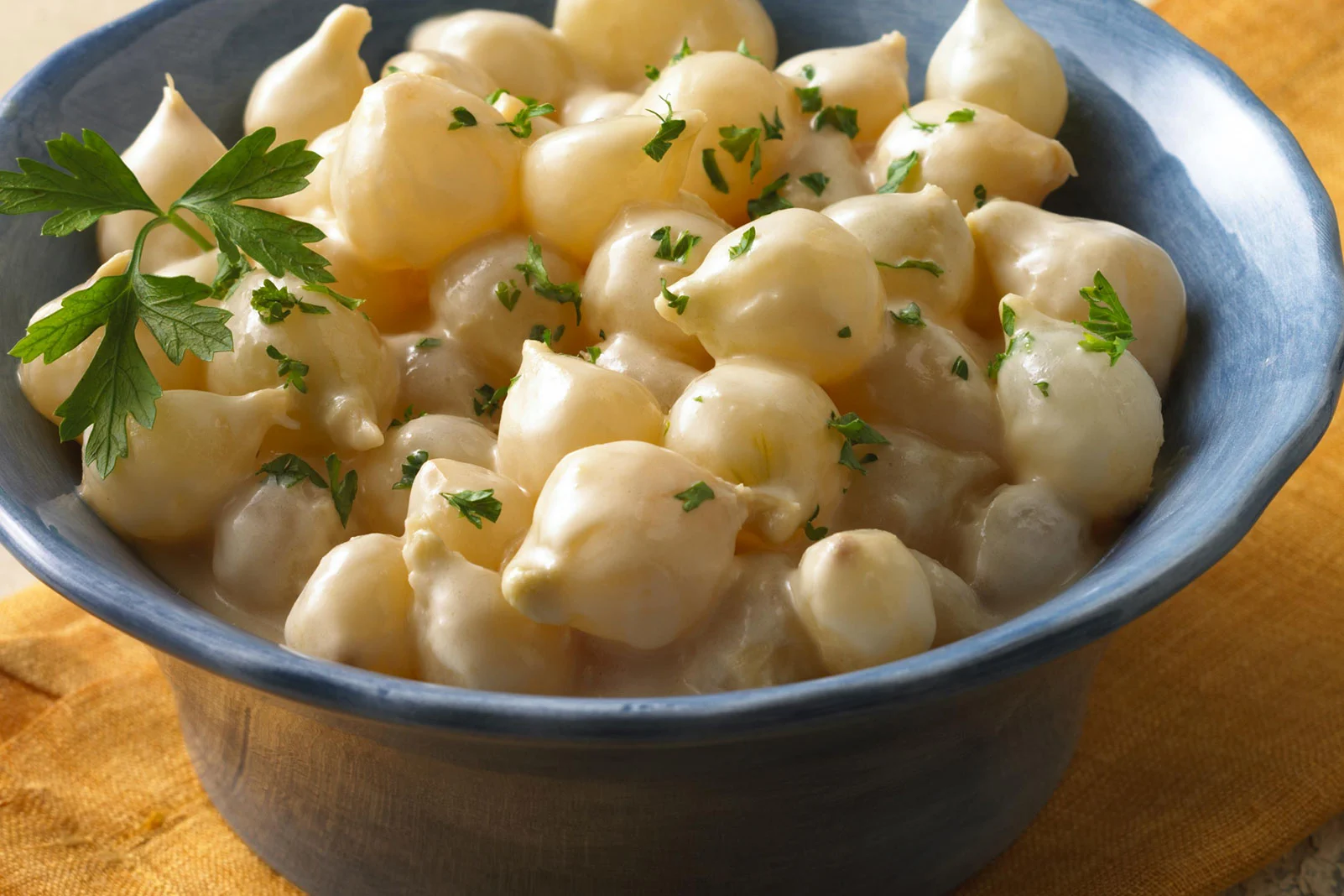 Creamy Braised Pearl Onions in White Cranberry Sauce